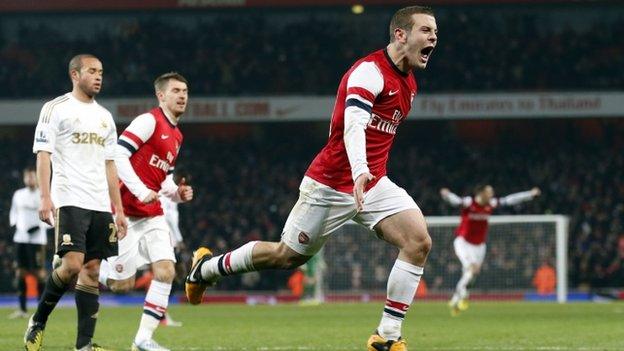 Jack Wilshere celebrates scoring