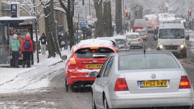 Queuing traffic in the snow