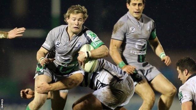 Connacht scrum-half Kieran Marmion is tackled in the Heineken Cup game