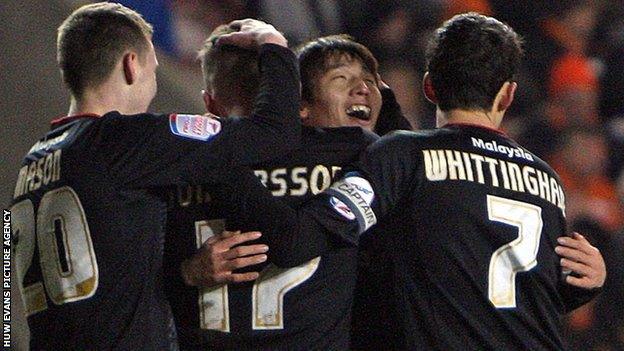 Cardiff City celebrate their opening goal at Blackpool