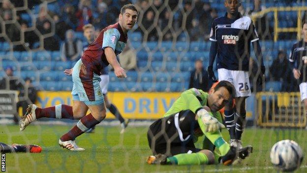 Sam Vokes heads Burnley ahead at Millwall on Saturday