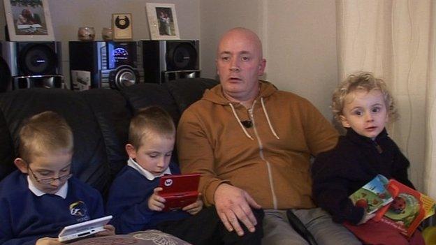 Andrew Dowling with three of his eight children, January 2013