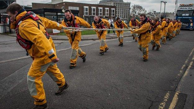 RNLI team pulling lifeboat