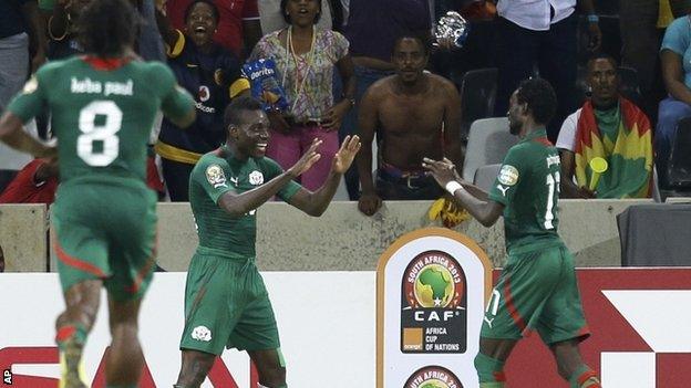 Alain Traore, center, celebrates scoring his opener against Ethiopia