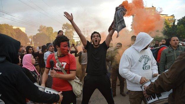 An Egyptian protester shouts slogans during a demonstration in opposition to President Mohammed Morsi in front of Cairo's Presidential palace on Friday.