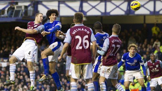 Marouane Fellaini (second left) heads in his side's equaliser against Aston Villa