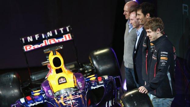 Red Bull's new RB9 is admired by Adrian Newey, Christian Horner, Mark Webber and Sebastian Vettel