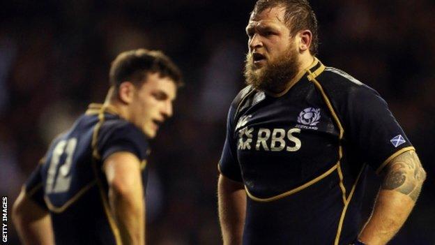 Scotland"s Ryan Grant stands dejected after the final whistle at Twickenham