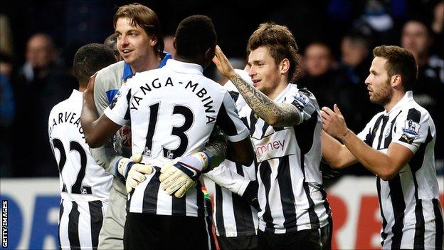 Tim Krul hugs Mapou Yanga-Mbiwa after the 3-2 win against Chelsea