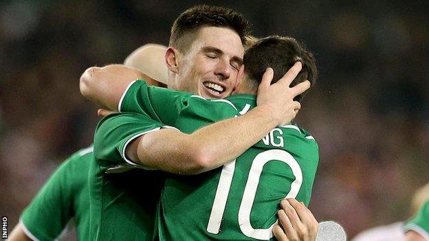 Ciaran Clark celebrates with Shane Long after scoring the Republic's first goal against Poland