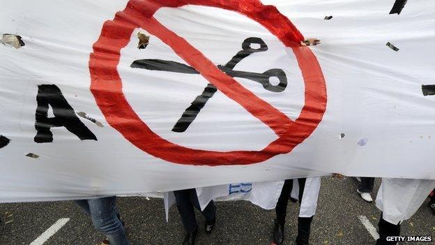 Workers attend a demonstration against the Spanish government's austerity measures