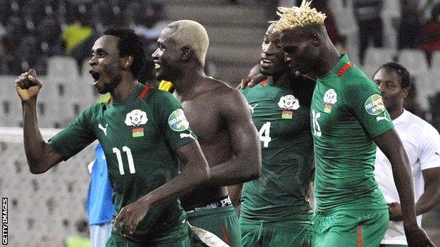 Burkina Faso winger Jonathan Pitroipa celebrates with teammates