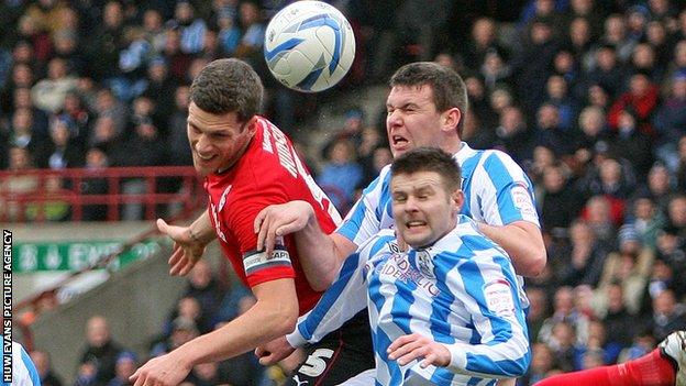 Cardiff captain Mark Hudson in action against Huddersfield