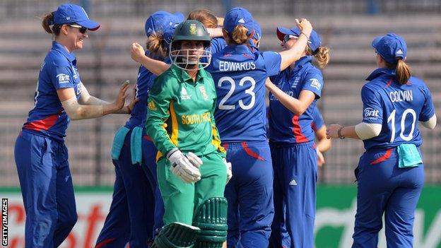 England celebrate a wicket