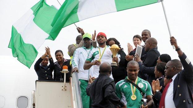The Super Eagles team bring the Nations Cup onto Nigerian soil for the first time in 19 years