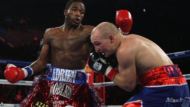 Adrien Broner lands a left on Gavin Rees