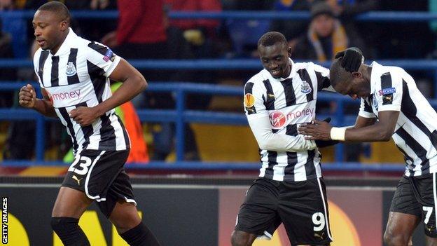 Newcastle celebrate their goal against Metalist Kharkiv