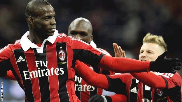 Mario Balotelli (left) celebrates scoring with AC Milan team-mates