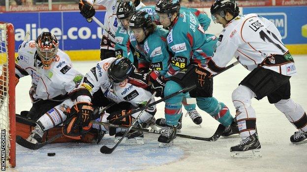 Mark Garside scores the opening goal against Sheffield on Saturday night