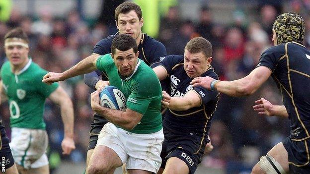 Rob Kearney is tackled by Tim Visser and Duncan Weir in Sunday's match at Murrayfield