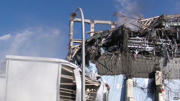 Water being discharged against unit 3 reactor building at the Fukushima Dai-ichi nuclear plant.