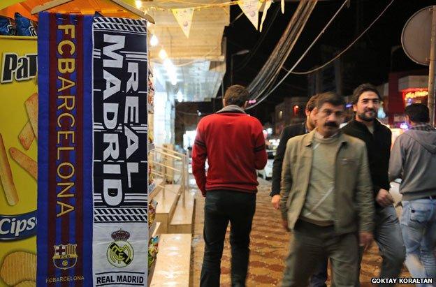Barca and Real Madrid banners on Kurdish street
