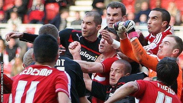 As Cardiff seek an equaliser, a goalmouth scramble resembles rugby action