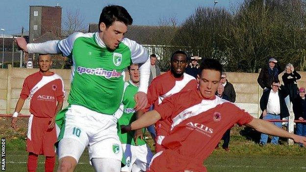 Guernsey striker Ross Allen takes on Walsall Wood