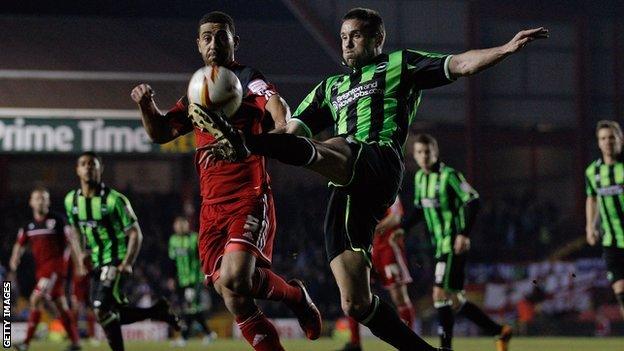 Matthew Upson clears for Brighton at Bristol City