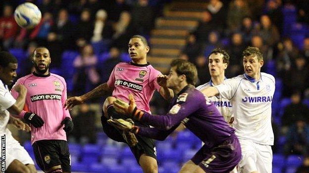 Dean Leacock (centre) in action for Notts