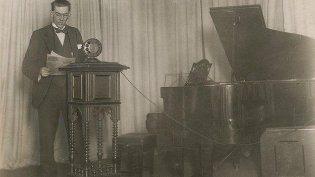 5SC’s first station director, Herbert Carruthers, addresses the microphone in the Bath Street studios