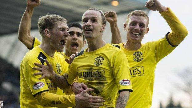 Hibernian beat Kilmarnock 4-2 to reach the last four in the Scottish Cup.