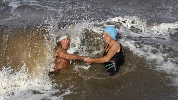 Richard and Dee Hamilton-Jones are caught in a huge wave.