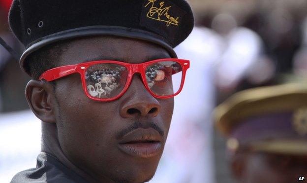 A man wearing a President Robert Mugabe designer label beret - 21 January 2013