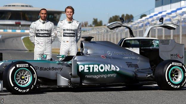 Mercedes drivers Lewis Hamilton (left) and Nico Rosberg