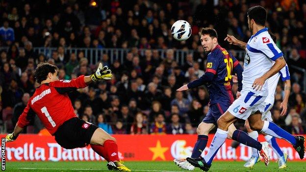 Lionel Messi (centre) scores for Barcelona