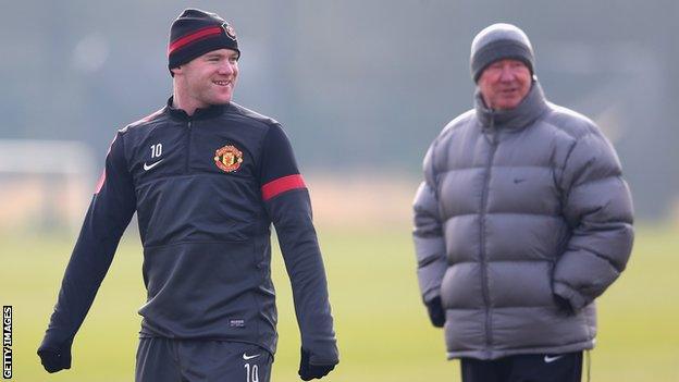 Manchester United striker Wayne Rooney and manager Sir Alex Ferguson