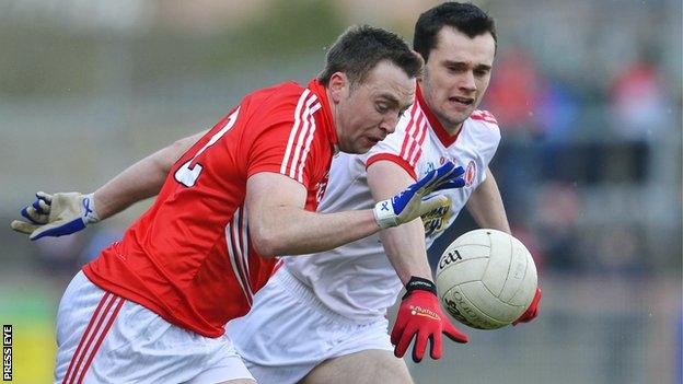 Cork's Paul Kerrigan in action against Ryan McKenna of Tyrone