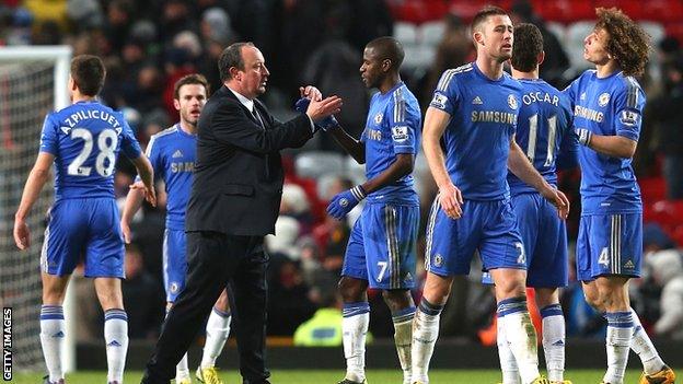 Rafael Benitez congratulates his players after Chelsea come from 2-0 down to draw 2-2 at Manchester United in the FA Cup