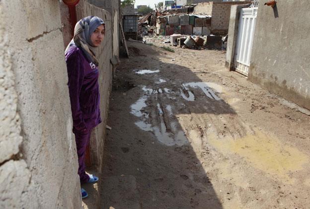 Marwa looks out at her neighbourhood