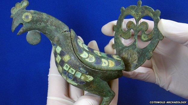 Enamelled cockerel found by Cotswold Archaeology