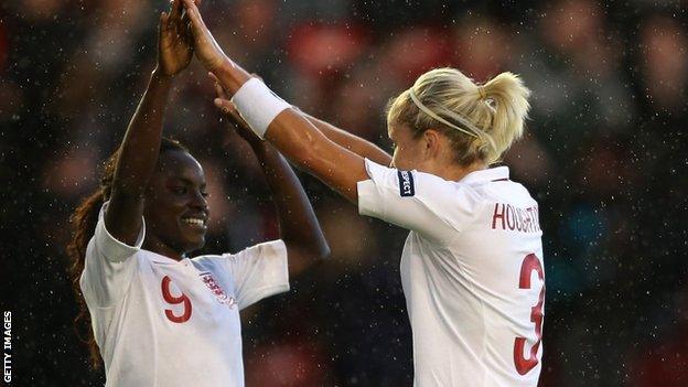 Eniola Aluko and Steph Houghton celebrate another England win