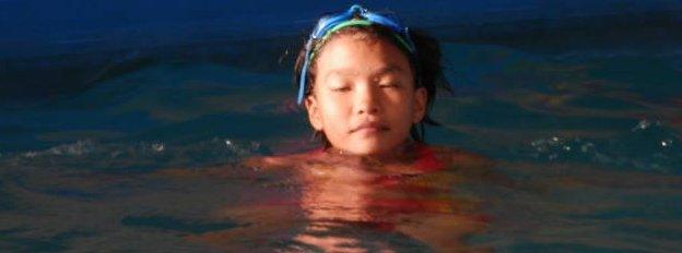 A girl learning to swim in Da Nang