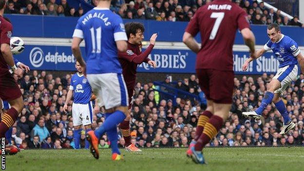 Leon Osman (far right) puts Everton ahead in the first half