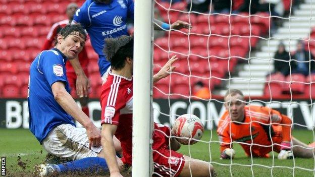 Birmingham striker Nikola Zigic scores