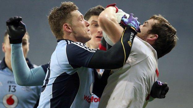 Dublin's Paul Flynn and Ronan McNamee of Tyrone compete for the ball