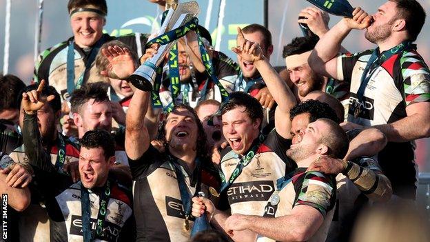 Harlequins players celebrate winning the LV= Cup