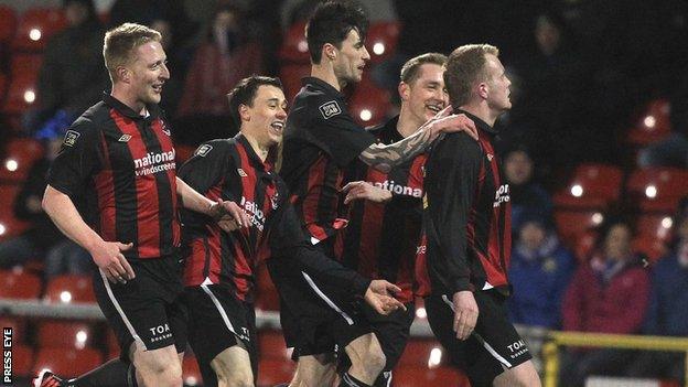 Crusaders players congratulate Jordan Owens after his opener against Linfield