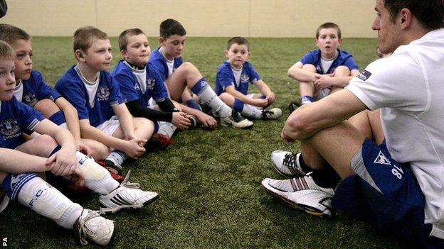 Phil Neville at a Sporting Chance event