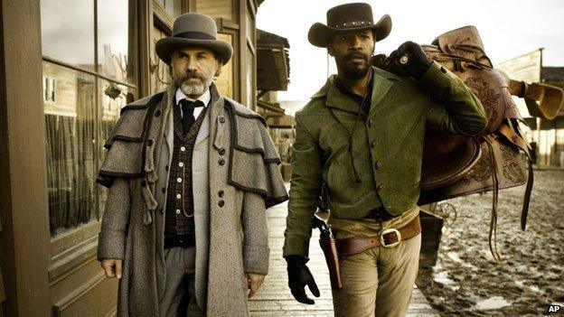 Jamie Foxx, with Christoph Waltz, in a scene from Django Unchained